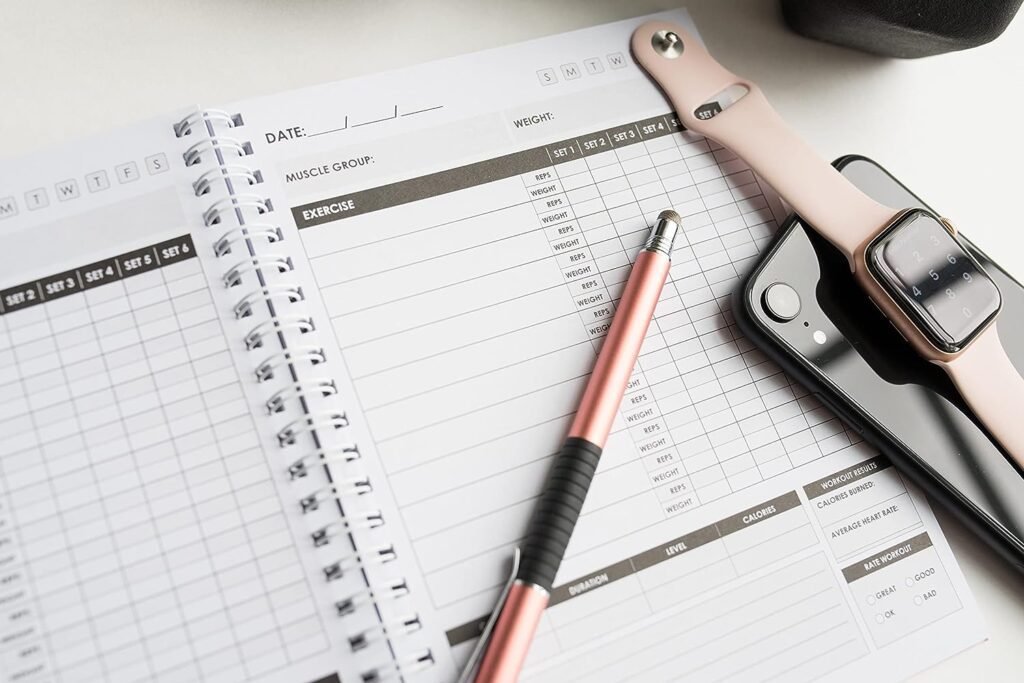 Fitness Journal Workout Planner for Men  Women - A6 Sturdy Workout Log Book to Track Gym  Home Workouts - Black Fitness Planner to Track Goals, Weight Loss and PR’s