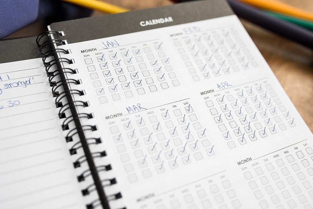 Fitness Journal Workout Planner for Men  Women - A6 Sturdy Workout Log Book to Track Gym  Home Workouts - Black Fitness Planner to Track Goals, Weight Loss and PR’s